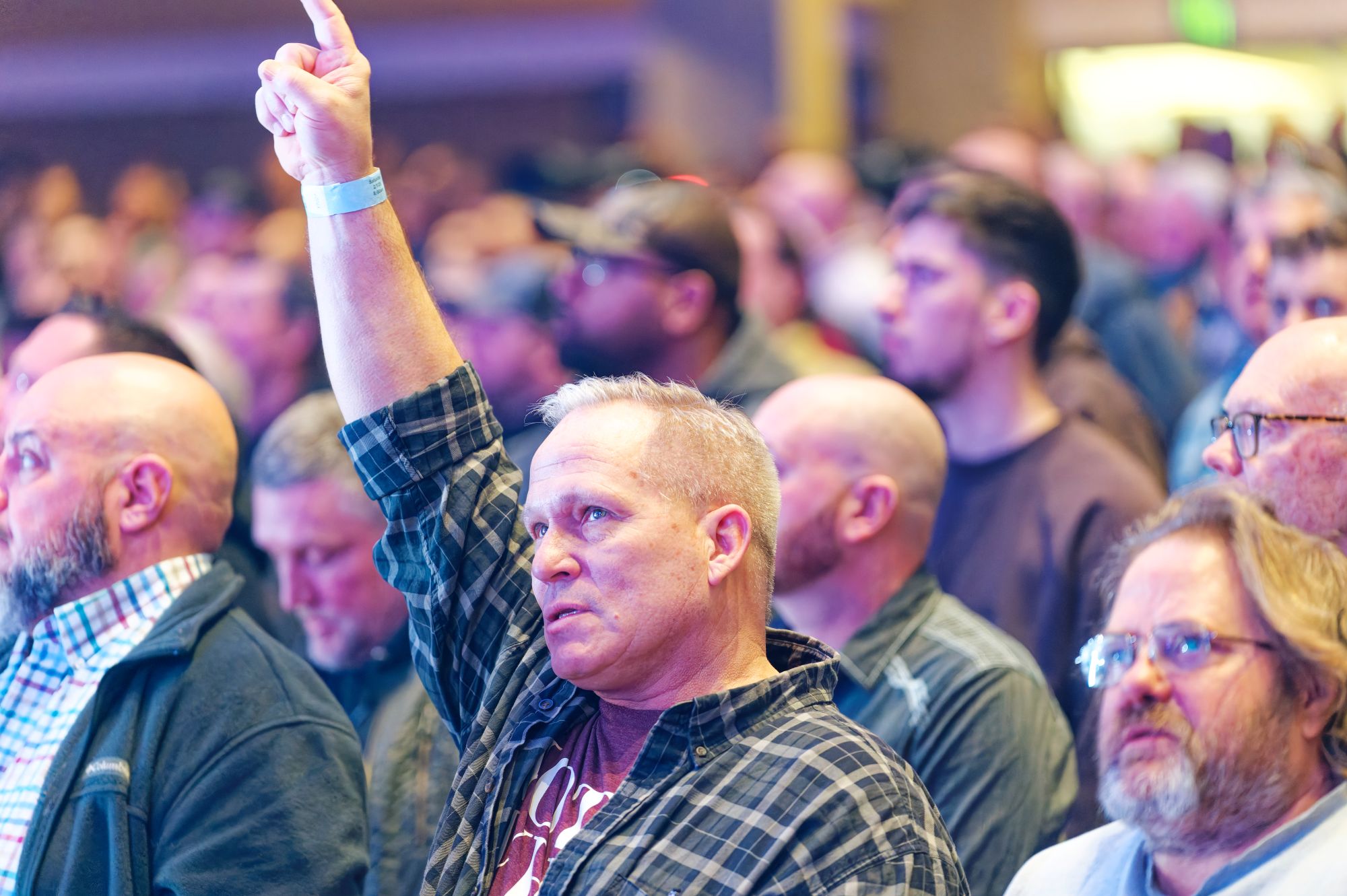 L1000064 Man worshipping at a conference